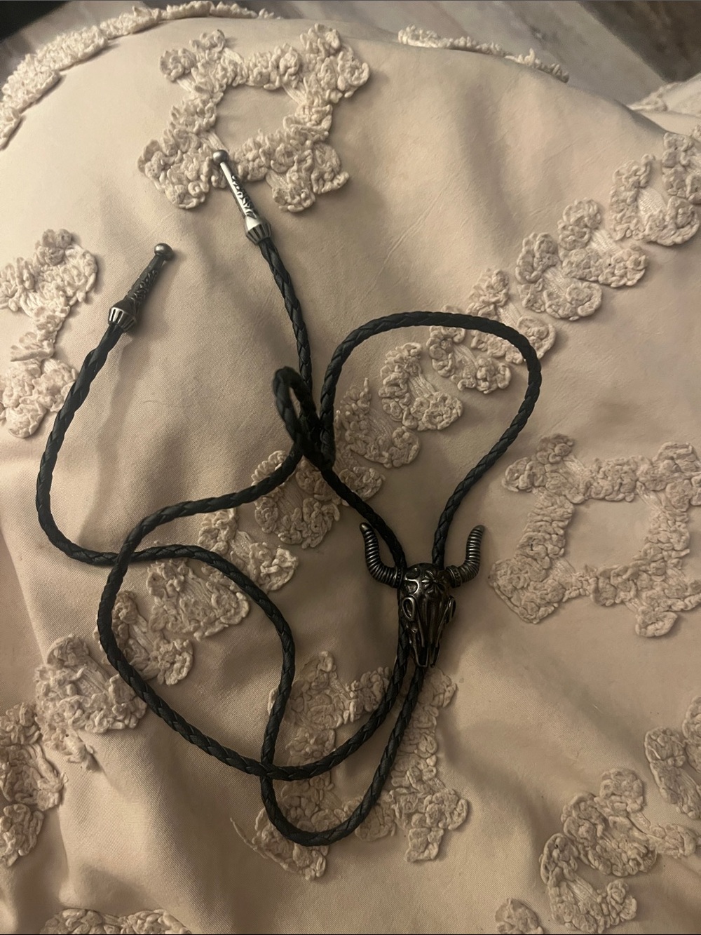 Black Braided Leather Bolo Tie with Horned Skull Accent